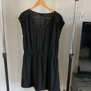 Black dress with gold v-neck design